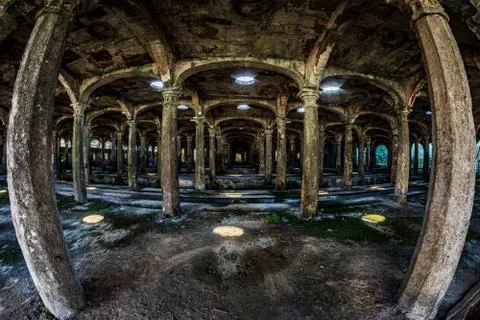 Horizontal image of the hall with countless columns Stock Photos