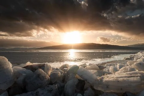 Horizontal image of Ice stacks at Vineyard Beach on Utah Lake in Utah at su.. Stock Photos