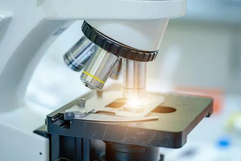 Horizontal image of the microscope. Ready for research. Bacteria and viruses  Stock Photos