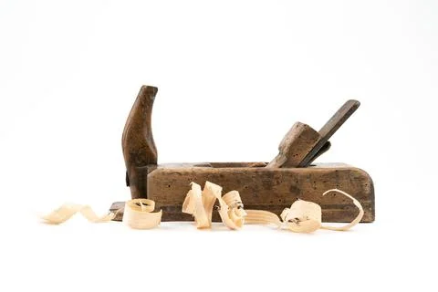 Horizontal low angle studio shot of small vintage wood planed isolated on white Photos