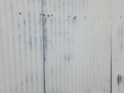 Horizontal metal siding texture with vertical ridges and light aging Stock Photos