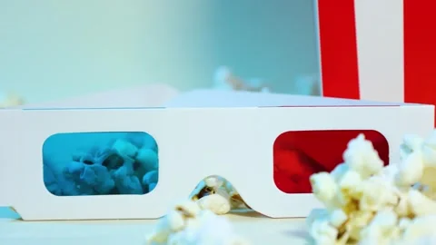 Horizontal motion close-up of popcorn and 3d glasses Stock Footage 288183941