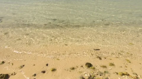 Horizontal move from left to right close up view of slight ocean sea clear water Stock Footage 235307408