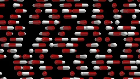 Horizontal movement of rotating pills closes the vulnerability. medical Stock Footage 82420922
