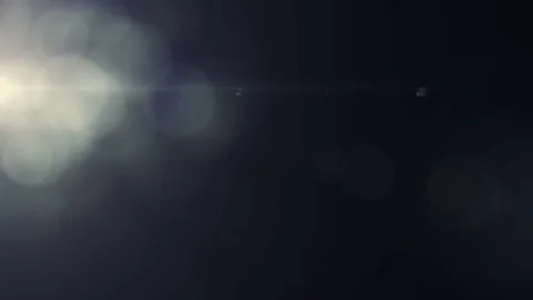 Horizontal moving lights optical lens flares shiny bokeh animation art Stock Footage 84639847
