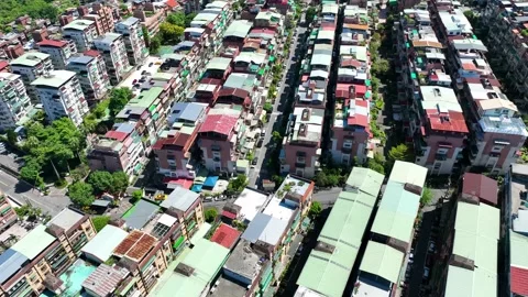 Horizontal moving shot rooftop ariel condominiumwith green forest area Stock-Footage 218347266