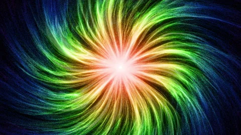 Horizontal neon spiral burst with rainbow trails, seamless loop Stock Footage 342054130