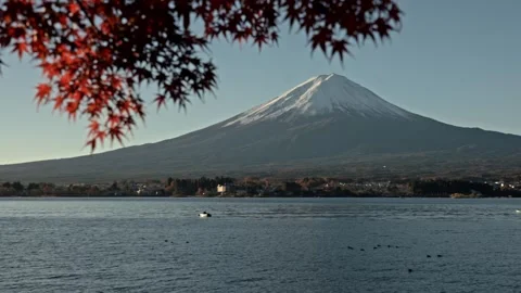 Horizontal pan right tracking across Lake Kawaguchiko to reveal Mt Fuji Stock Footage 339639954