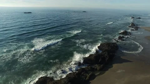 Horizontal pan shot of the wave on Oregon Coast Stock Footage 55805143