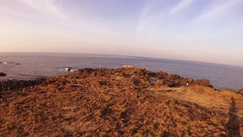 Horizontal pane look out view of coastal scenery at Dung Lung Cliff with dry bro Stock Footage 240483255