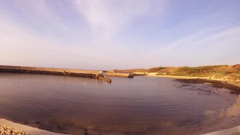 Horizontal pane look out view of  Shui'an Yugang and beach coastal side in a har Stock-Footage 240483260