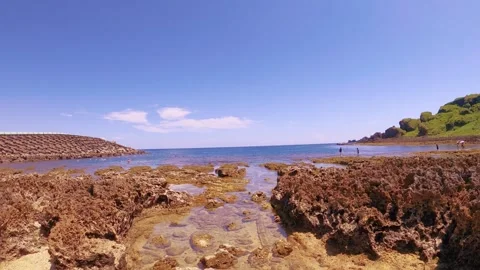Horizontal pane view from left to right look out to mountain hill ocean blue hor Stock Footage 303409588