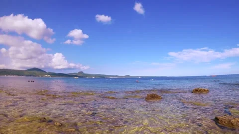 Horizontal pane view from left to right look out to mountain hill ocean blue hor Stock Footage 303410093