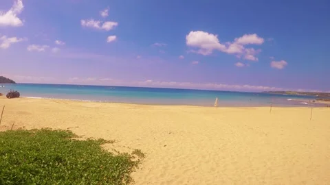Horizontal pane view look out to a peaceful beach from land to ocean horizon wit Stock Footage 280776190