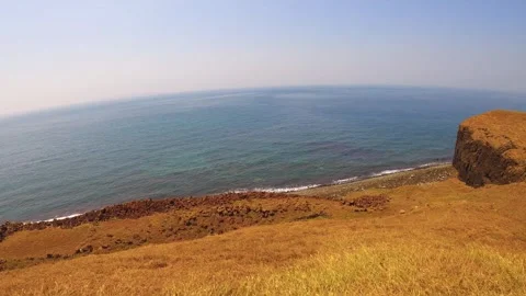 Horizontal pane view of ocean scape look out to Toujinyu and ocean horizon from  Stock Footage 242330675
