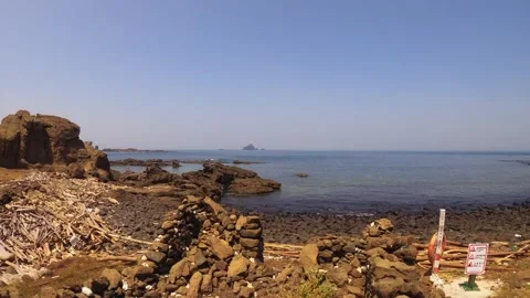 Horizontal pane view of ocean scape look out to Toujinyu from north shore coast  Stock Footage 242330852