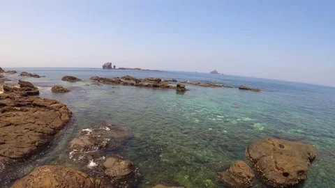 Horizontal pane view of ocean scape look out to South Tiezhenyu to Toujinyu from Stock Footage 242331197