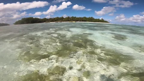 Horizontal pane view of Oneroa and Koromiri and Taakoka  islets look out to hori Stock Footage 250400739