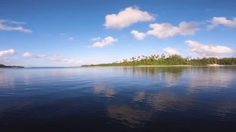 Horizontal pane view at the rocky shore look out to Avana harbor passage with is Stock Footage 253459101