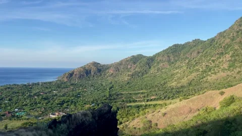 Horizontal Panning Scenic Mountain Landscape and Ocean View Pemuteran Bali Stock Footage 335941195