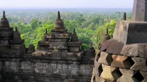 Horizontal Panning Shot of Borobudur Temple Stupas Java Indonesia Stock Footage 338275997