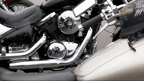 Horizontal panning shot of chromed motorcycle engine Stock-Footage 88555468