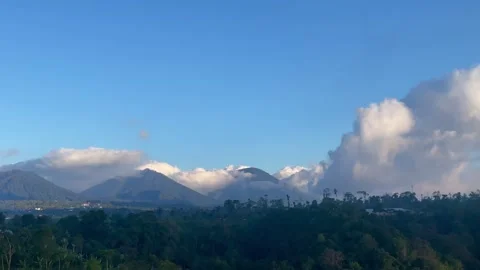 Horizontal Panning Shot of Cloud Covered Mountain Range in Bali Stock Footage 341809039
