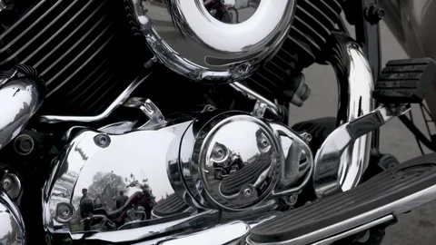 Horizontal panning shot on yellow chromed motorcycle Stock-Footage 88555887