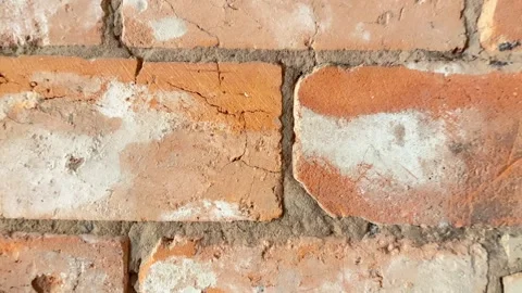 Horizontal panning video of aged red brick masonry Stock Footage 336448522