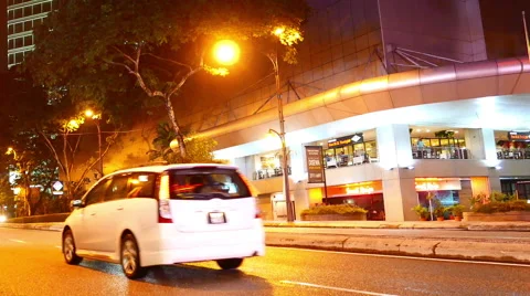 Horizontal panning view of the night traffic in Kuala Lumpur Stock Footage 63497038
