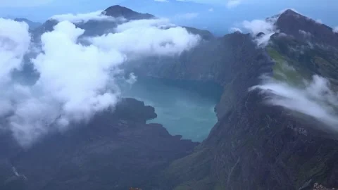Horizontal Panning Wide Shot of Mount Rinjani Caldera and Lake Stock Footage 338340926