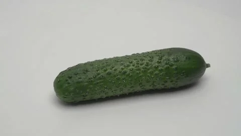 Horizontal panorama of a cucumber on a white background. Stockbeeldmateriaal 266010385