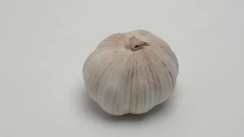 Horizontal panorama of garlic on a white background. 스톡 동영상 266008496