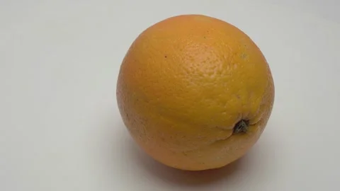 Horizontal panorama of an orange on a white background. Stockbeeldmateriaal 266009488