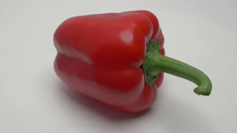 Horizontal panorama of red sweet pepper on a white background. Видео 266010071
