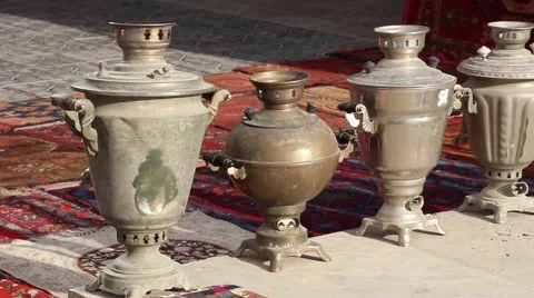 Horizontal panorama(side view) of old samovars, teapots and jugs Video stock 56832624
