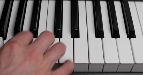 Horizontal playing piano Stock Footage 156857542