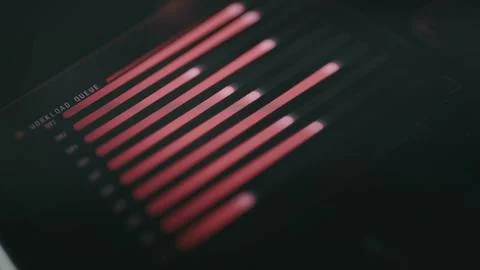 Horizontal red bars form a technical workload visualization Stock Photos