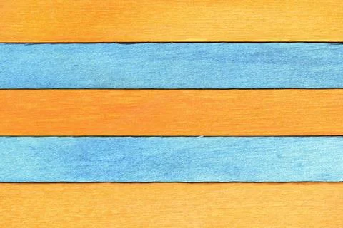 Horizontal retro background of alternating painted wooden boards in orange and Stock Photos