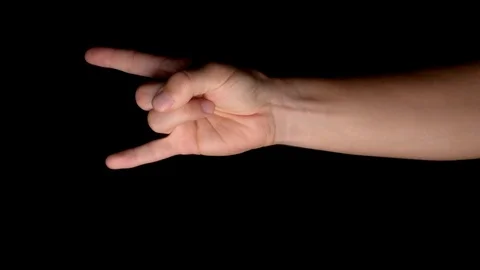 Horizontal rock music hand devil sign on a chroma key black screen, static Stock Footage 117788721