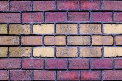 Horizontal row of yellow brown bricks symmetrical background design urban 스톡 사진