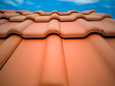 Horizontal rows of new anthracite clay tiles for sale in building material store Stock Photos