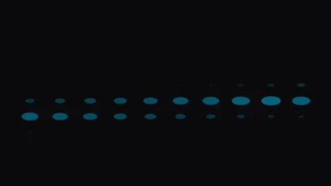 A horizontal sequence of blue circles fading in size against a dark backgroun Video stock 339619238