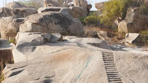 Horizontal shot of ancient rocks in India, Ancient rocks with stairs Stock Footage 151938549