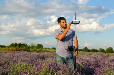 Horizontal shot of land surveying work Stock Photos