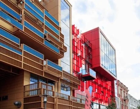 A horizontal shot of led panels on the facade of the building with mirror win Stock Photos