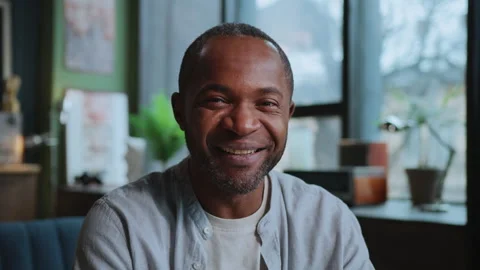 Horizontal shot of smiling handsome African American man in casual outfit Stock Footage 238747769