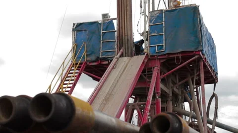 Horizontal slide shot of drilling rig Stock Footage 58102836