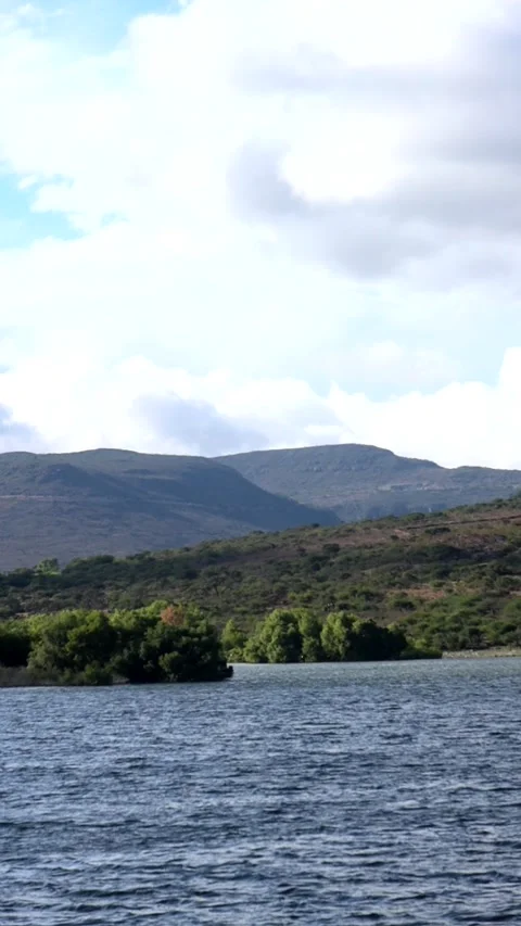 Horizontal Slow motion lake waves for background Stock Footage 214617197