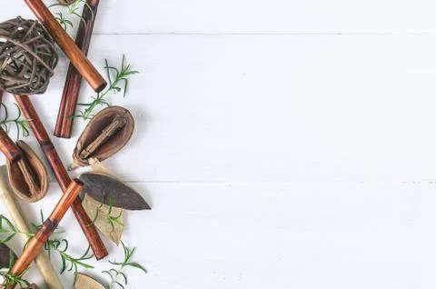 Horizontal SPA flat lay border. Dry bamboo, fresh sprouts on a light wooden b Stock Photos